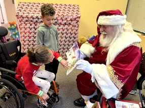 children read with Santa